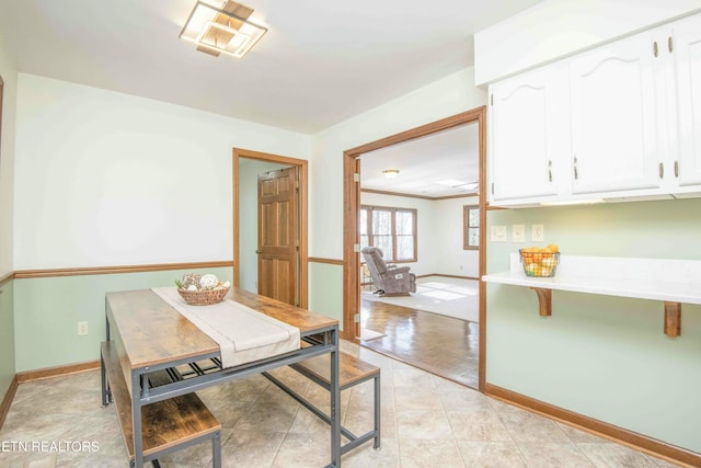 dining room with light parquet floors