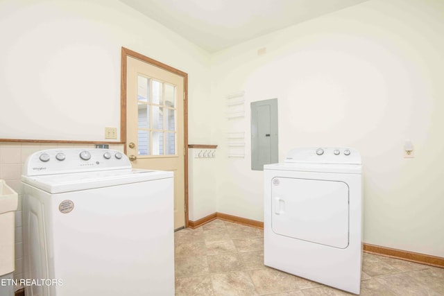 washroom featuring electric panel and independent washer and dryer