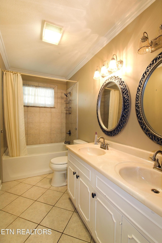 bathroom with ornamental molding, a sink, and tile patterned floors