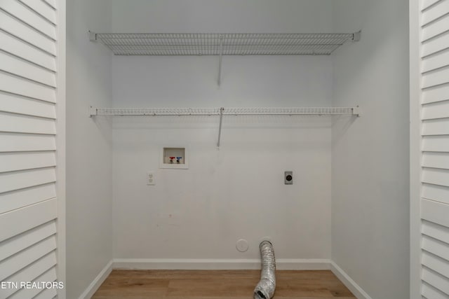 laundry room with washer hookup, hookup for an electric dryer, and light wood-type flooring