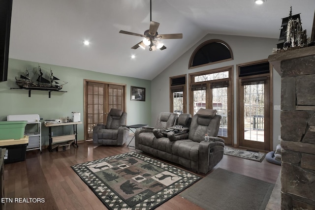 living room featuring high vaulted ceiling, dark hardwood / wood-style floors, and ceiling fan