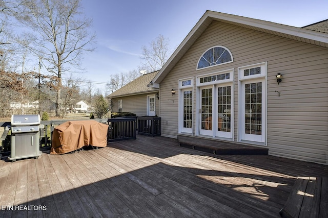 wooden terrace with grilling area