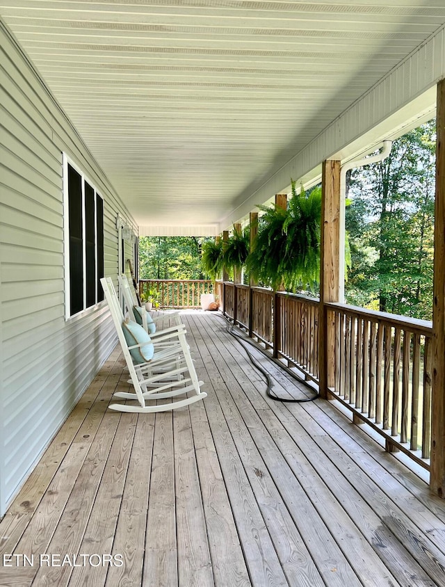 deck featuring covered porch