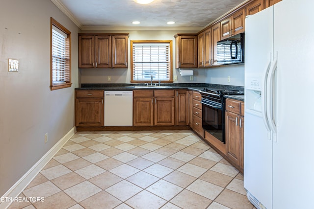 kitchen featuring crown molding, sink, light tile patterned floors, and black appliances