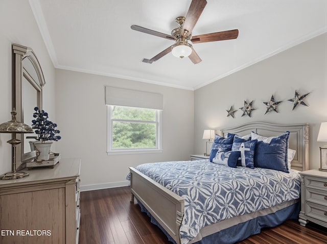 bedroom with dark wood finished floors, ornamental molding, baseboards, and ceiling fan