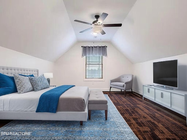 bedroom featuring vaulted ceiling, a ceiling fan, and baseboards