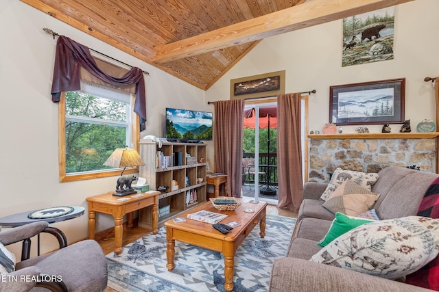 living room featuring wood-type flooring, wood ceiling, a wealth of natural light, and beamed ceiling