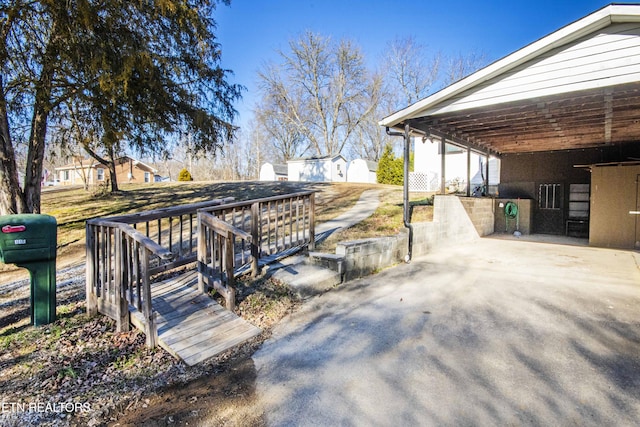 wooden terrace with an outdoor structure