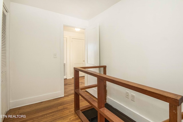 hall featuring wood-type flooring