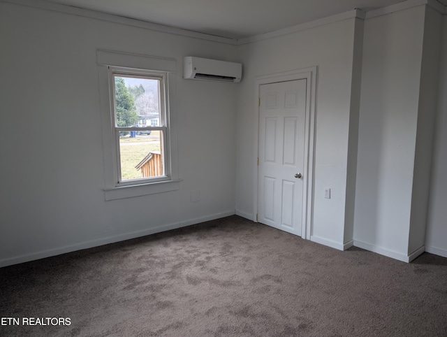 unfurnished bedroom featuring crown molding, an AC wall unit, and carpet floors