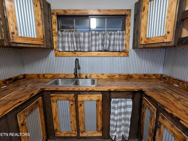 kitchen featuring sink and butcher block countertops