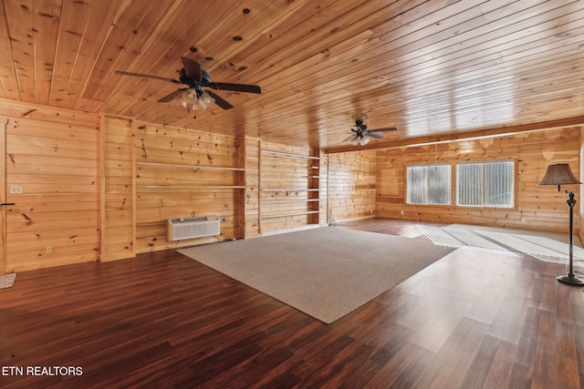 interior space featuring an AC wall unit, wooden walls, hardwood / wood-style floors, and wood ceiling