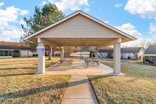 view of home's community with a gazebo and a yard