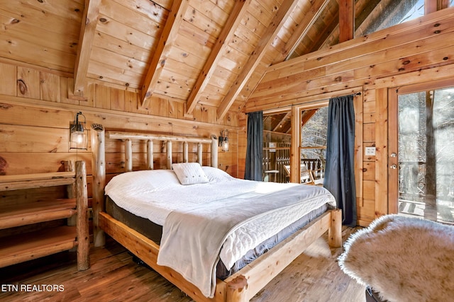 bedroom featuring hardwood / wood-style floors, wood walls, beamed ceiling, access to outside, and wooden ceiling