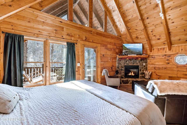 bedroom with a fireplace, wood walls, wooden ceiling, beamed ceiling, and access to exterior