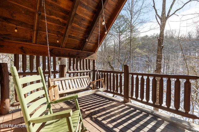 view of snow covered deck