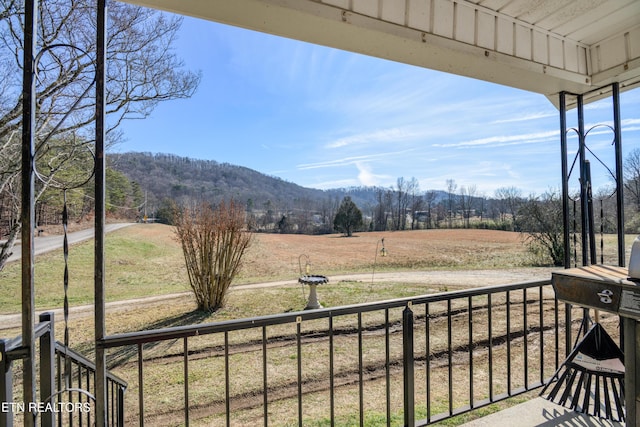 exterior space featuring a mountain view and a rural view