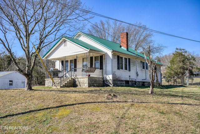 view of front of home with a front lawn and covered porch