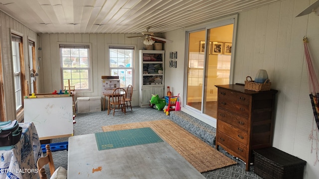 sunroom / solarium with ceiling fan