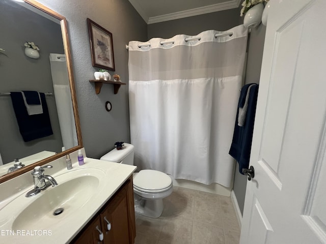 bathroom featuring vanity, ornamental molding, and toilet