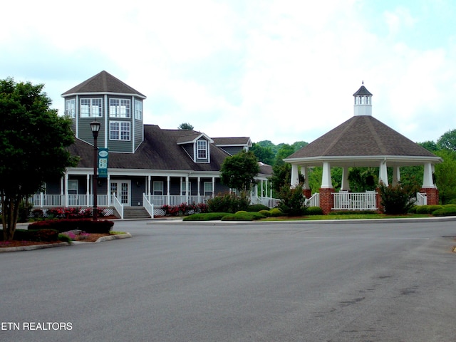 view of front of home featuring a gazebo and a porch