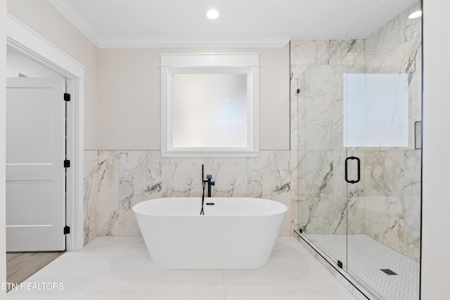 bathroom with recessed lighting, tile walls, ornamental molding, a soaking tub, and a marble finish shower