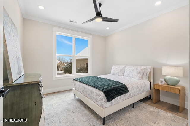 bedroom featuring crown molding, recessed lighting, visible vents, light wood-type flooring, and baseboards