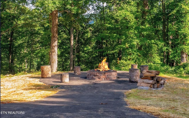exterior space featuring a fire pit