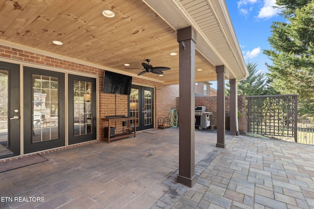 view of patio with grilling area, ceiling fan, and french doors