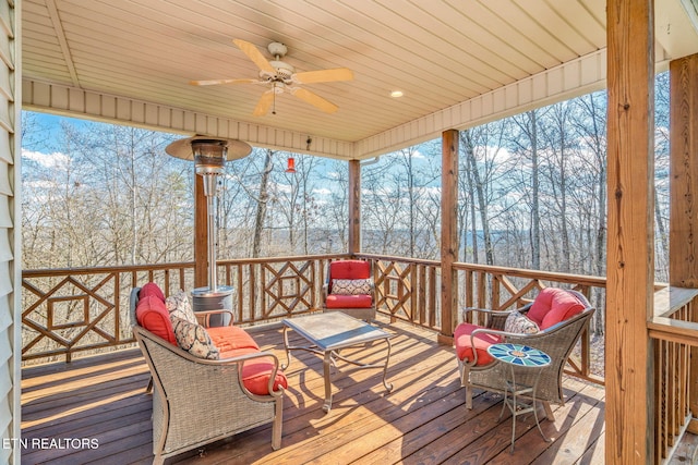 wooden deck with ceiling fan