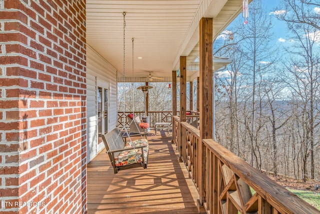 wooden terrace with covered porch