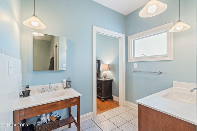 bathroom featuring vanity and tile patterned flooring