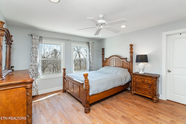 bedroom featuring ceiling fan and light wood-type flooring