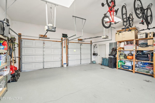 garage featuring a garage door opener