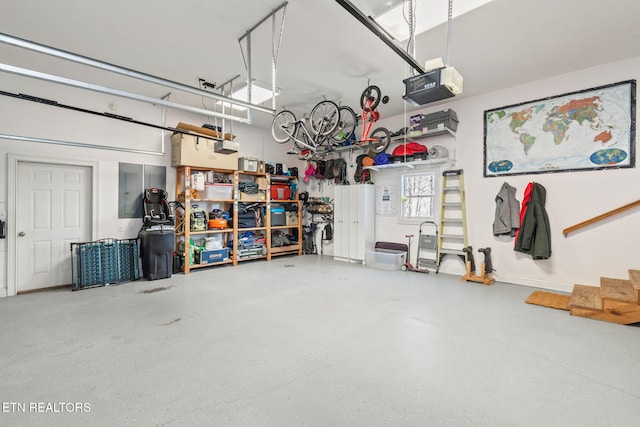 garage featuring a garage door opener