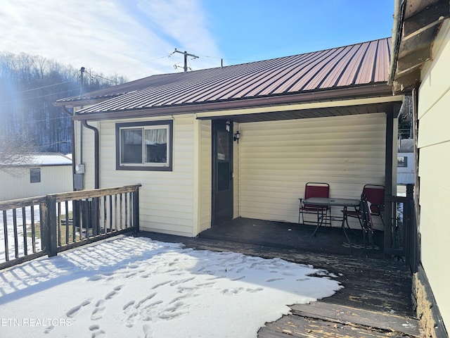 view of snow covered house