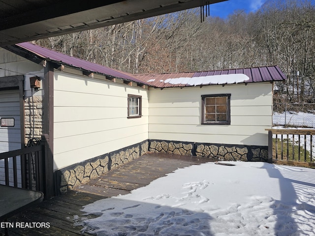 view of snow covered deck