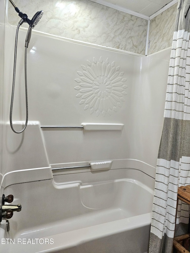 bathroom with shower / bathtub combination with curtain