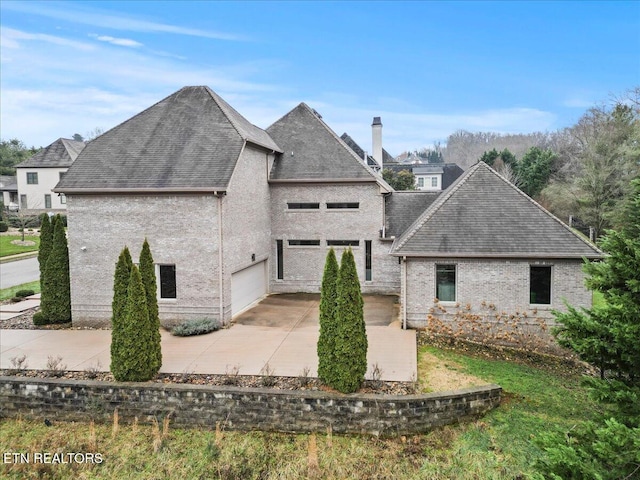 view of home's exterior with a garage