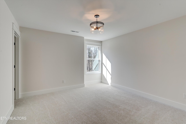 view of carpeted spare room