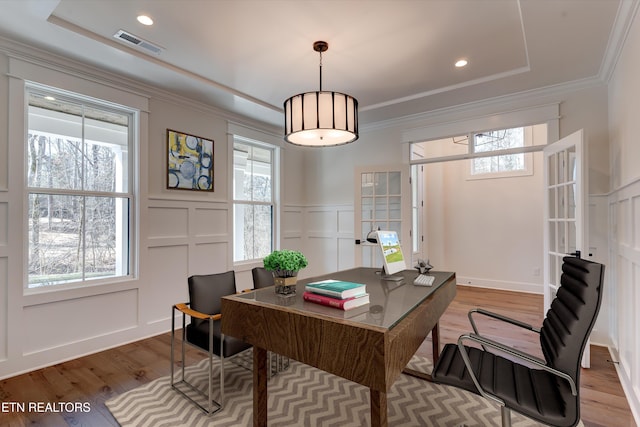 office area with crown molding and a healthy amount of sunlight