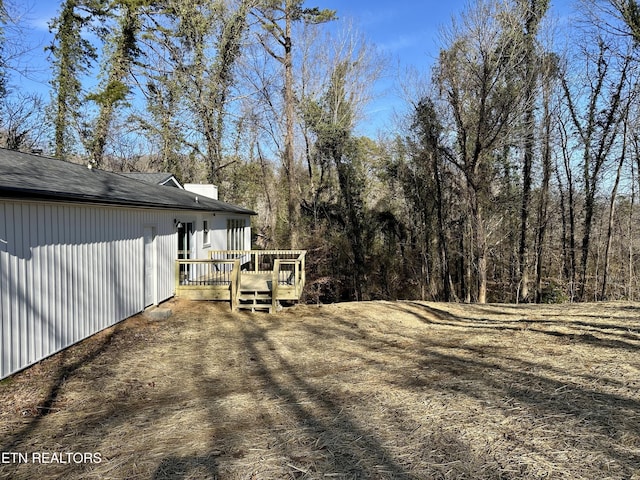 view of yard with a deck