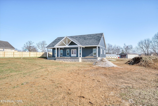 view of front of property with a front lawn and covered porch