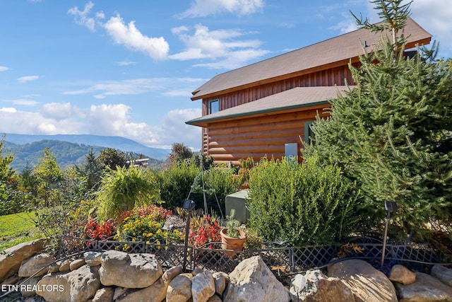 exterior space featuring a mountain view