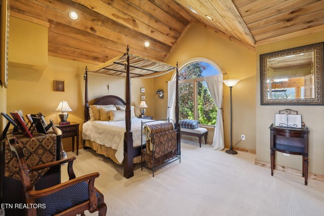 carpeted bedroom with lofted ceiling and wood ceiling