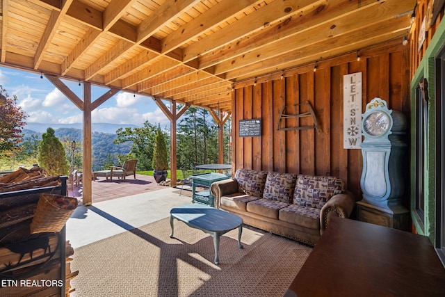 view of patio featuring a mountain view and an outdoor hangout area