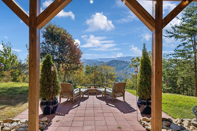 view of patio featuring a mountain view