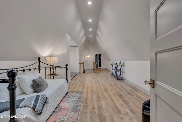 309 W Cleveland Ave, Monterey, TN 38574 - bedroom with light hardwood / wood-style flooring and vaulted ceiling