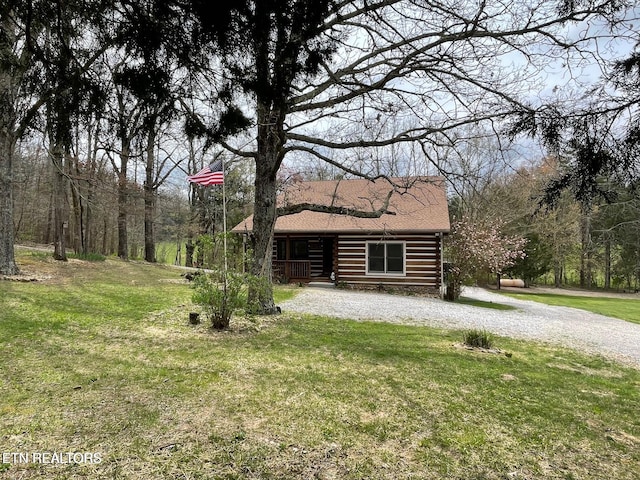 exterior space with a front lawn