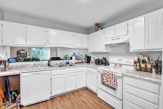 kitchen with white cabinetry, sink, white appliances, and light wood-type flooring